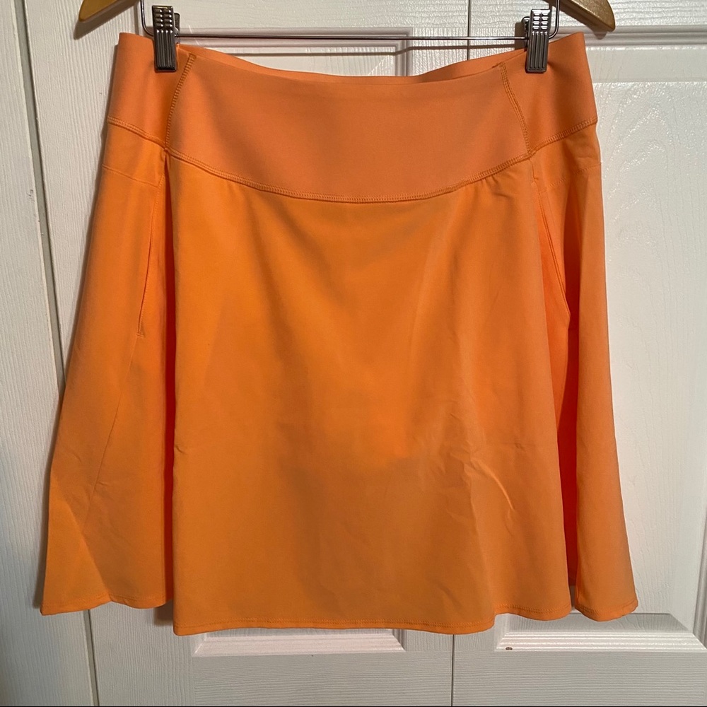 Puma orange tennis skort with pockets and shorts